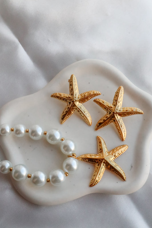 Brincos Starry Shell